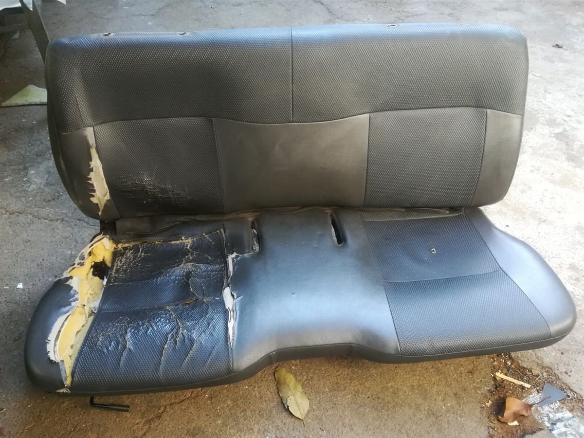 Damaged NP300 seat before interior upgrade